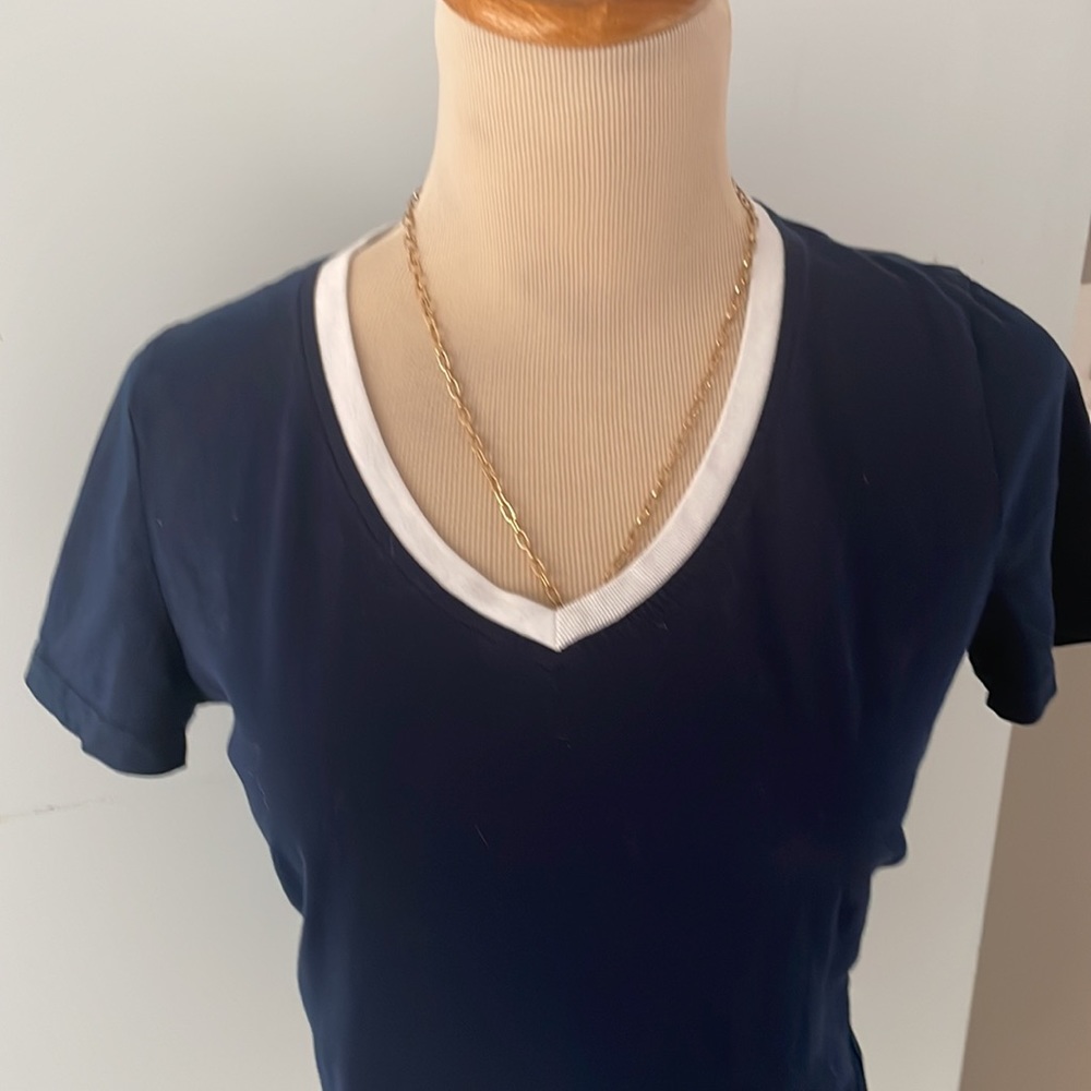 Ralph Lauren V neck navy tee with white trim. /S